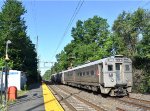 Arrow III Cab Car # 1321 trails on NJT Train # 481 out of Murray Hill Station as it moves a little west along the siding to wait for Train # 414 to clear